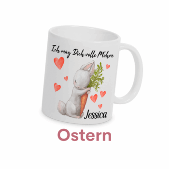 Kategoriebild für Kategorieübersicht. Weiße Tasse mit süßem Osterdesign: Ein liebevoller Hase umarmt eine Möhre, umgeben von roten Herzen. Die Aufschrift „Ich mag Dich volle Möhre“ macht sie zu einem perfekten Geschenk für Ostern. Mit Personalisierungsmöglichkeit für den Namen.